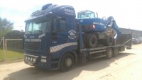 Transport wózków widłowych maszyn koparek Poznań 600-960-987